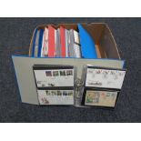 A box of six folders of first day covers