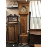 A nineteenth century pine longcased clock with painted dial,