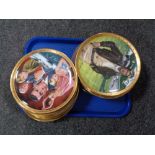 A tray of Franklin Mint heirloom collector's plates - John Wayne and James Bond