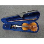 A twentieth century Chinese violin with bow in case