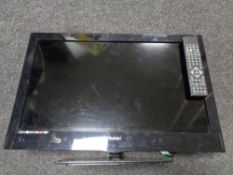 A Technike 23 inch LED TV with remote