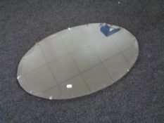 A 20th century oval mirror