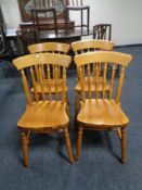 Four pine dining chairs