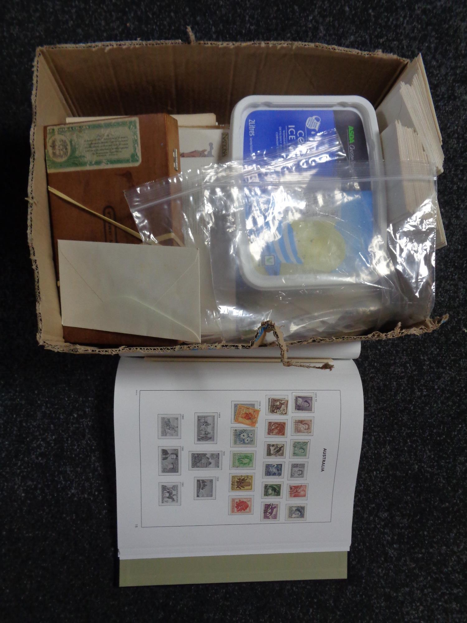 A box of loose stamps and first day covers relating to Australia and New Zealand
