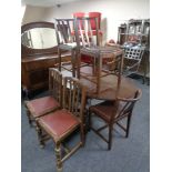 A 1930's oak pull out table,