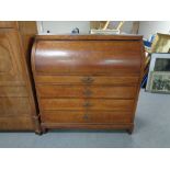 A nineteenth century oak cylinder bureau