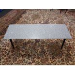 A mid 20th century Formica topped coffee table