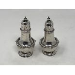 A pair of silver pepperettes (2)