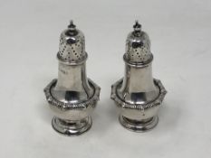 A pair of silver pepperettes (2)