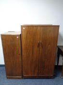 A 1930's walnut double door linen cabinet and sentry door cupboard