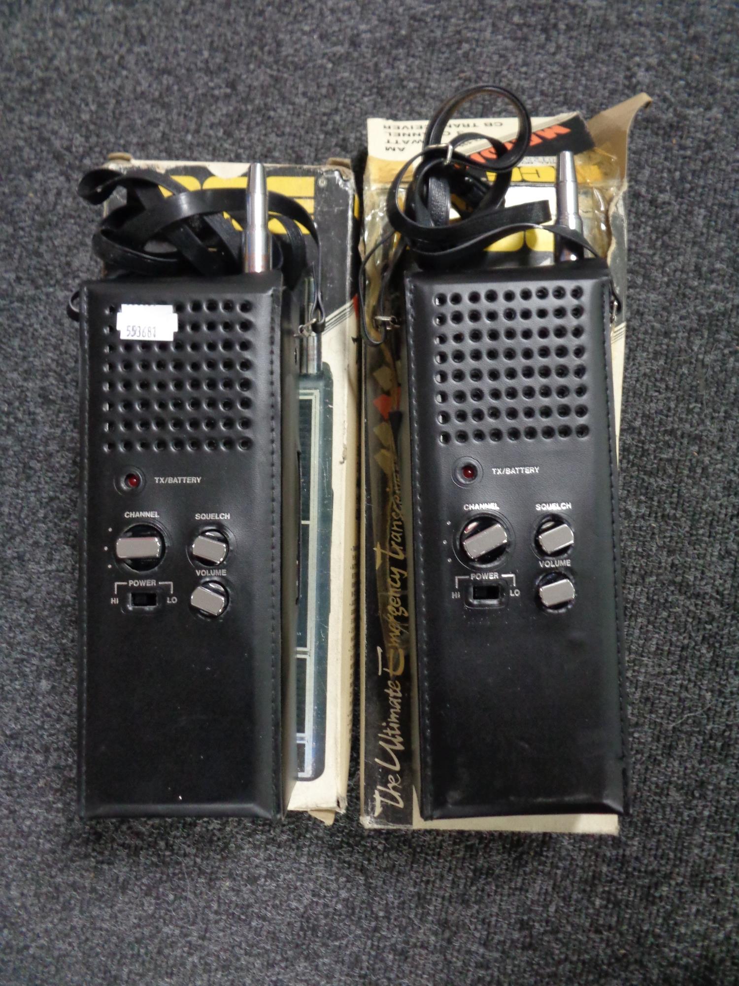 Two boxed MCE Mayday three channel transceivers