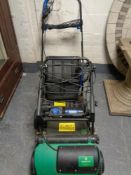 A Garden Line scarifier and McAlister MRS 1400 scarifier