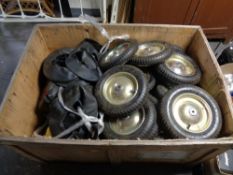 A wooden crate of sack barrow wheels and inner tubes (as found)