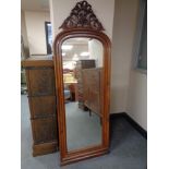 A nineteenth century continental walnut hall mirror