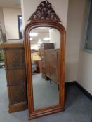 A nineteenth century continental walnut hall mirror
