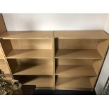 Two sets of pine effect open bookshelves,