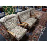 A three piece wood framed cottage lounge suite in tapestry fabric