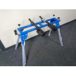 A folding table saw stand