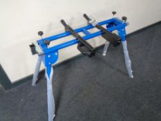 A folding table saw stand