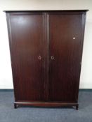 A Stag Minstrel double door wardrobe and a 5' headboard