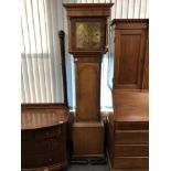 A nineteenth century oak longcased clock with brass dial,