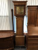 A nineteenth century oak longcased clock with brass dial,