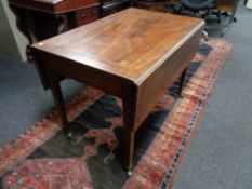 A Victorian inlaid mahogany Pembroke table