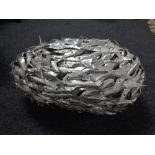 A piece of contemporary metal art - fishes