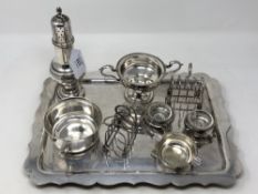A collection of silver plated items including tray, sugar castor,