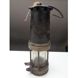 A vintage miner's lamp
