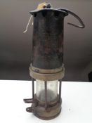 A vintage miner's lamp