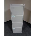 A four drawer Bisley metal filing cabinet with key