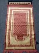 Two eastern woolen prayer rugs