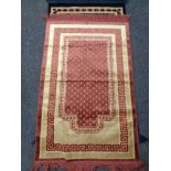 Two eastern woolen prayer rugs