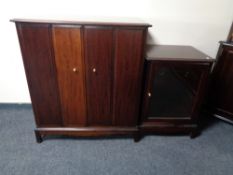 A Stag Minstrel double door TV cabinet and hi/fi cabinet