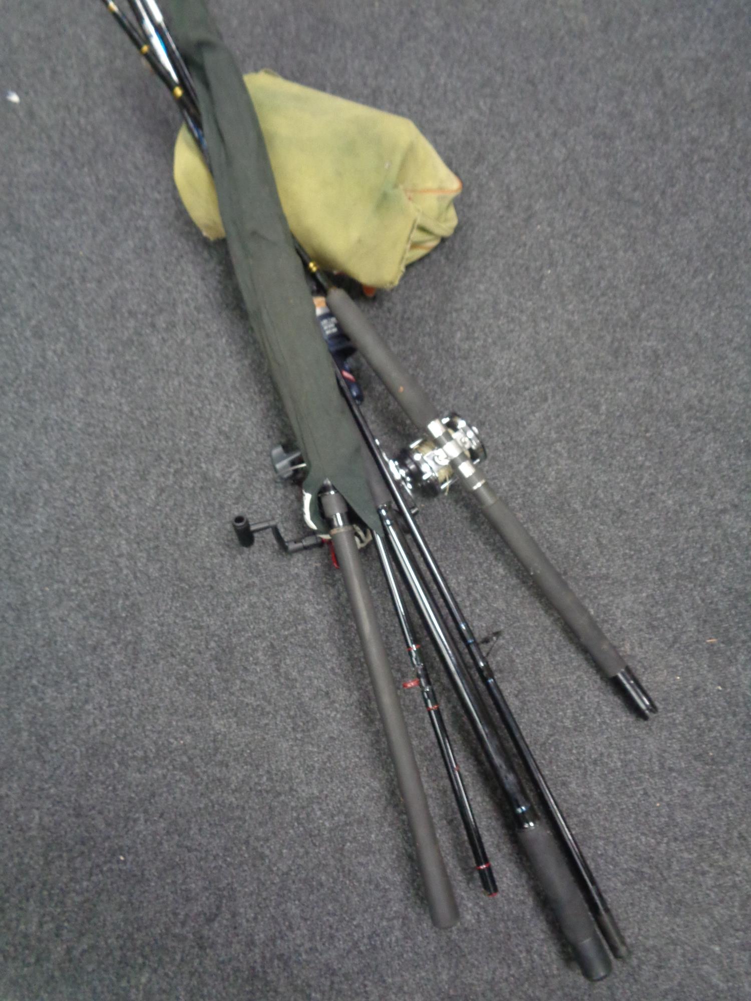 A collection of fishing rods - Jarvis Walker Mirage 10ft beach rod, Penn Senator rod etc,