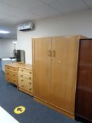 A three piece mid 20th century G Plan bedroom suite comprising double wardrobe,