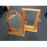 Two pine toilet mirrors