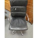 A Vitra Charles Eames designed soft pad executive swivel office chair upholstered in black leather