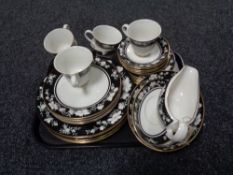 A tray of thirty-three pieces of Royal Doulton Intrigue tea and dinner service