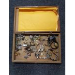 A wooden box of costume jewellery, lady's wrist watches,