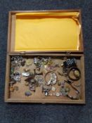 A wooden box of costume jewellery, lady's wrist watches,