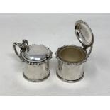 A pair of silver mustard pots, James Dixon & Son.