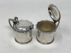 A pair of silver mustard pots, James Dixon & Son.