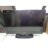 A Philips 32 inch LCD TV with remote (continental wiring)