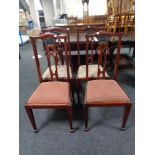 A set of four Edwardian Arts & Crafts dining chairs