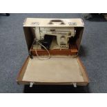 A cased 20th century National sewing machine (continental wiring)