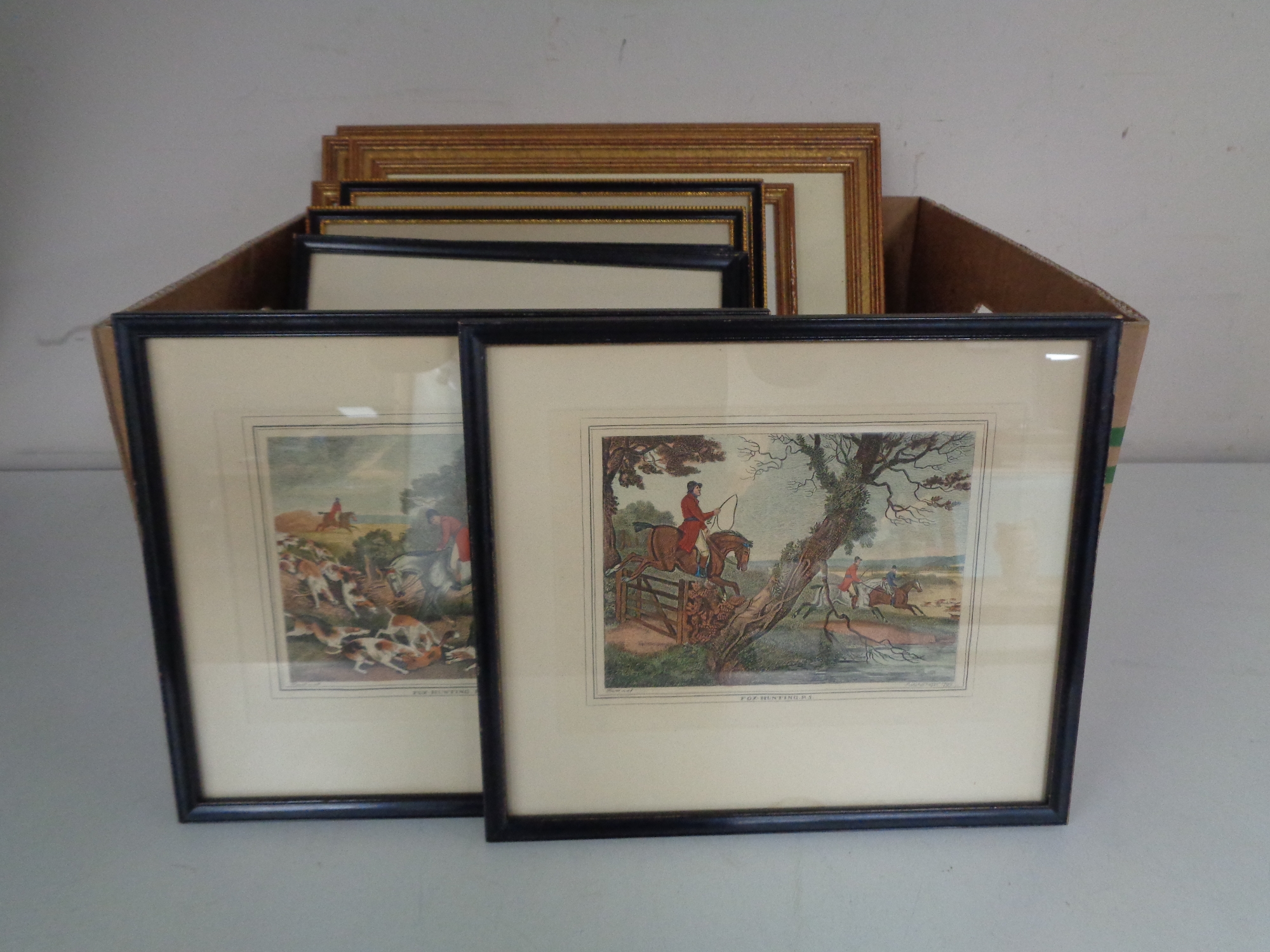 Two boxes of antiquarian hand coloured engravings,