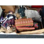 Two boxes of dolls, table linen,