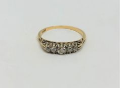 An 18ct gold five stone diamond ring, size N1/2 CONDITION REPORT: 2.